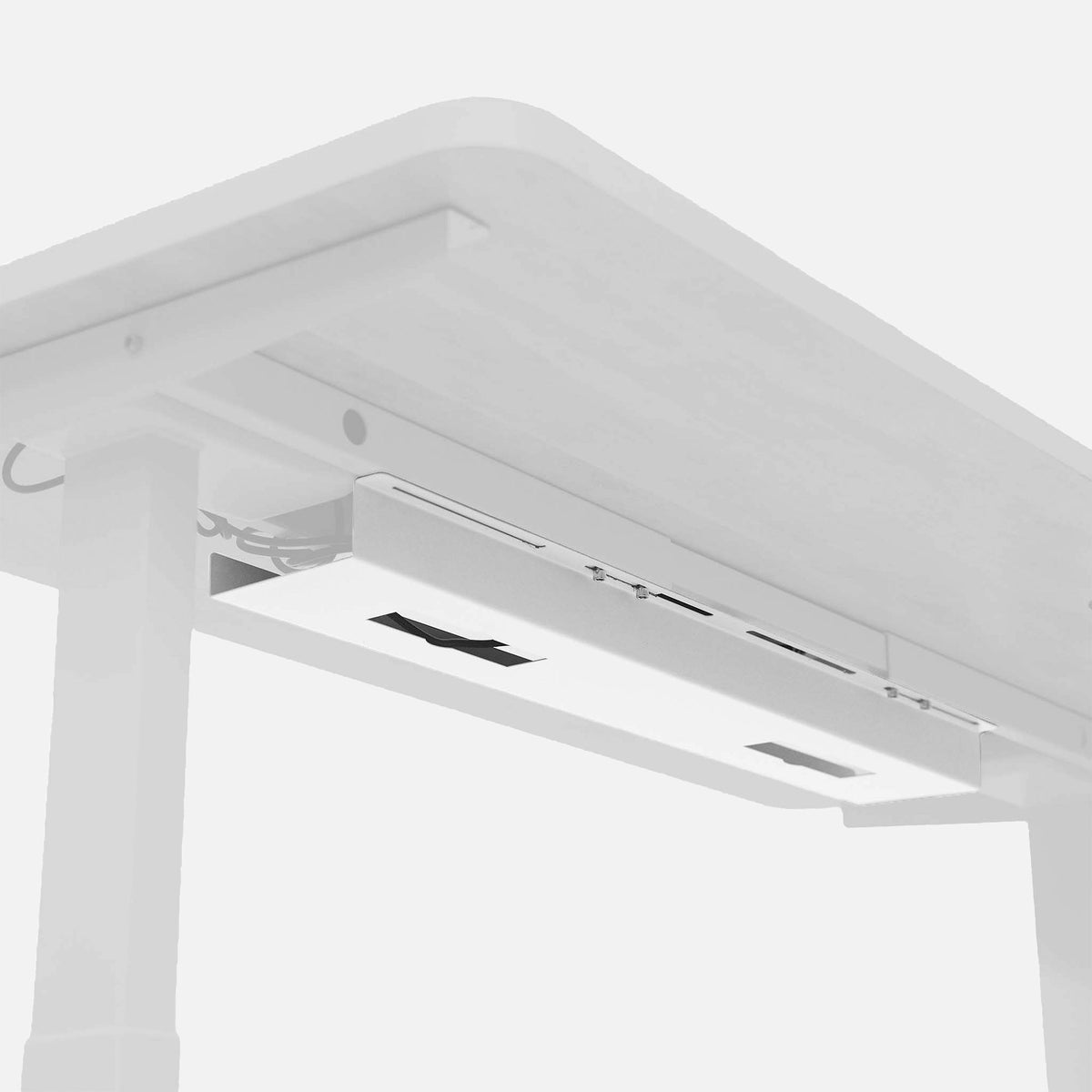 White MotionGrey cable tray installed beneath a desk