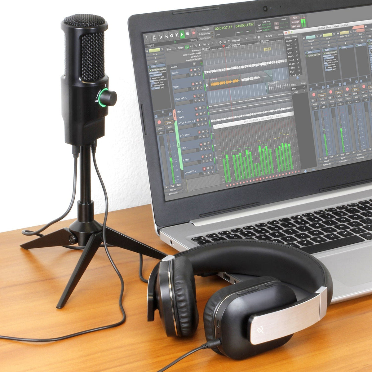 Aluratek AUVM01F microphone beside a computer and headphones