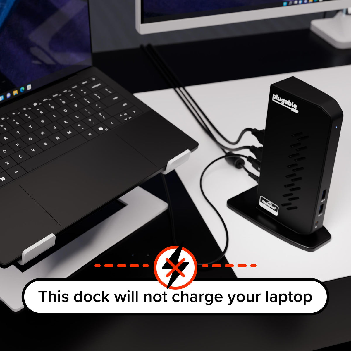 Plugable UD-3900Z beside laptop with no laptop charging warning