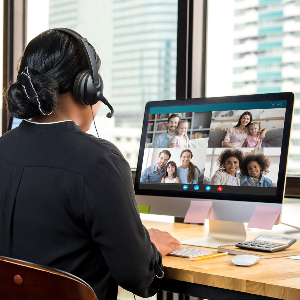 Aluratek AWHU02FB headset worn for a video conference