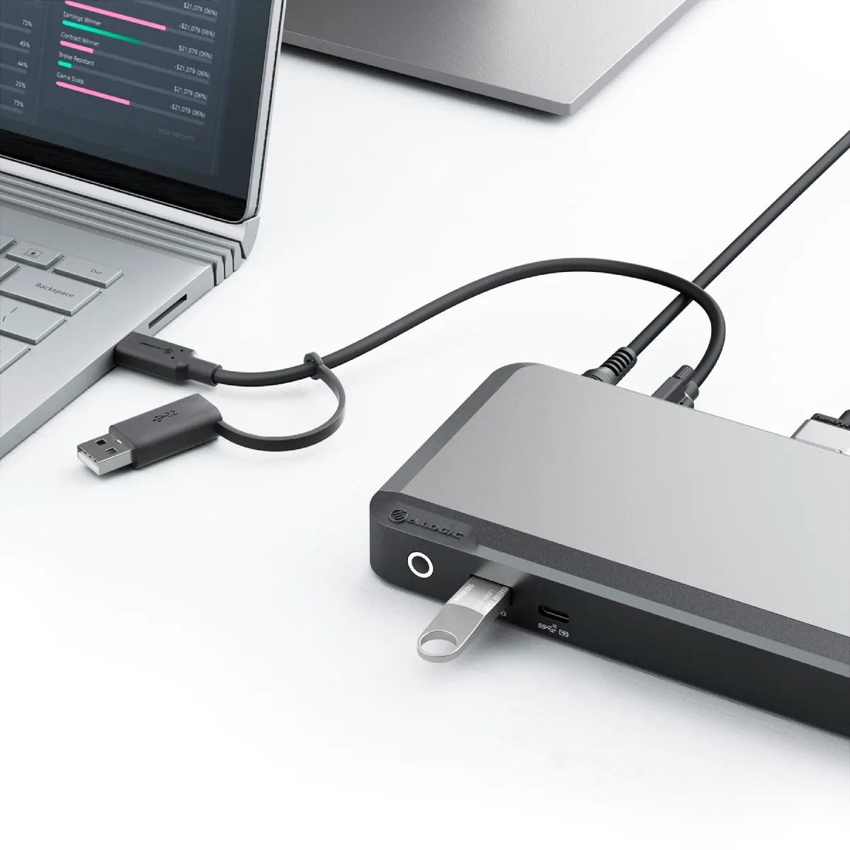 ALOGIC MX2 dock connected to a laptop desk setup