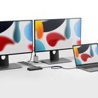 ALOGIC MV2 dock in a desk setup with two monitors