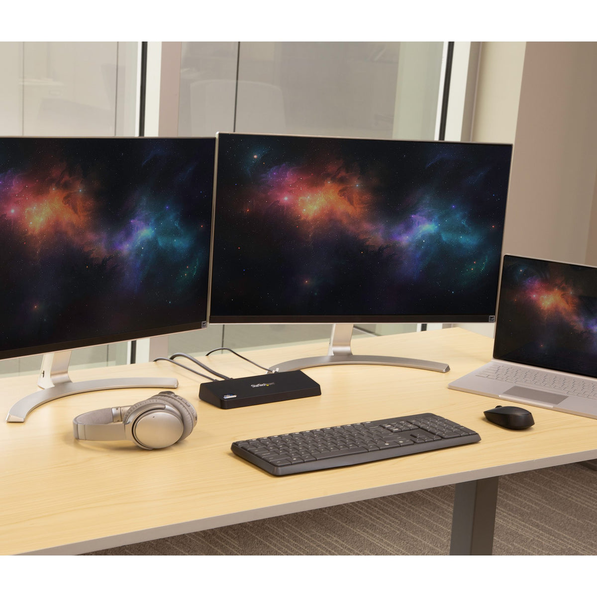 StarTech USB3DOCKHDPC dock connected in a dual-monitor desk setup
