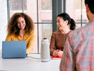Meeting Owl 3 on a table during a group video meeting