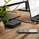 ALOGIC DUTHD dock beside laptop on desk