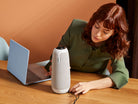 Meeting Owl 3 connected beside a laptop
