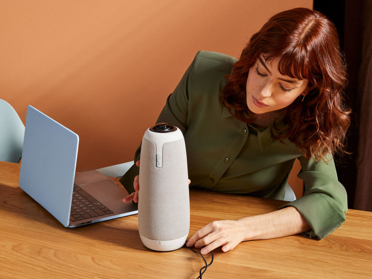 Meeting Owl 3 connected beside a laptop