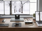 ALOGIC Turbo dock connected beside a laptop and monitor