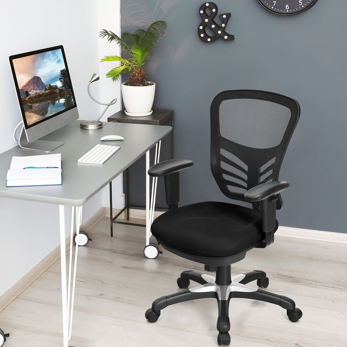 Costway black mesh office chair in a desk setup